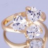 Bague en plaqué or 10Ct.  avec des Zirconium de tailles coeurs.