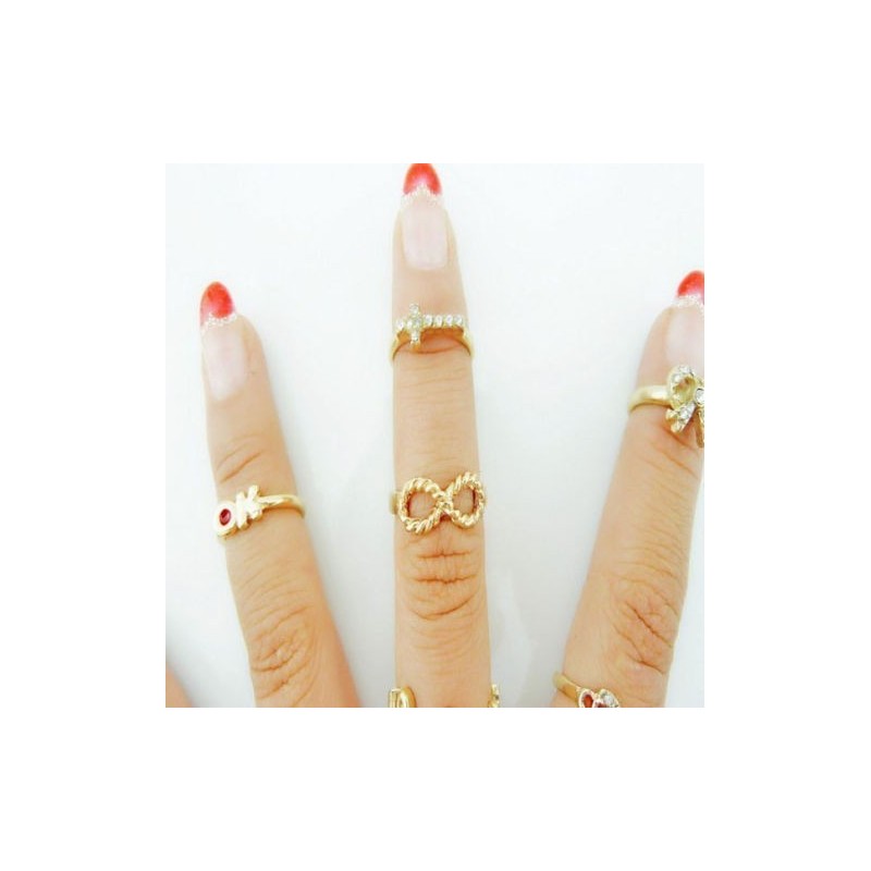 LOT : sept bagues de phalanges dorées