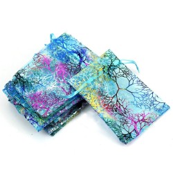 Organza bleu rose or : motifs arbres arabesques... et son petit cordonnet assortiMatériaux utilisés: OrganzaTrès jolies po