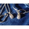 Parure : pendentif + bracelet : chaussons de bébé - Poinçonnée .925