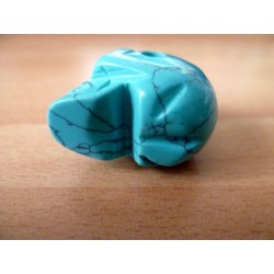 Collier Crane de cristal percé. Turquoise. 3 x 2.5 x 2cm. 17 g. Percé pour le porter en collier. Livré avec un cordon noir.