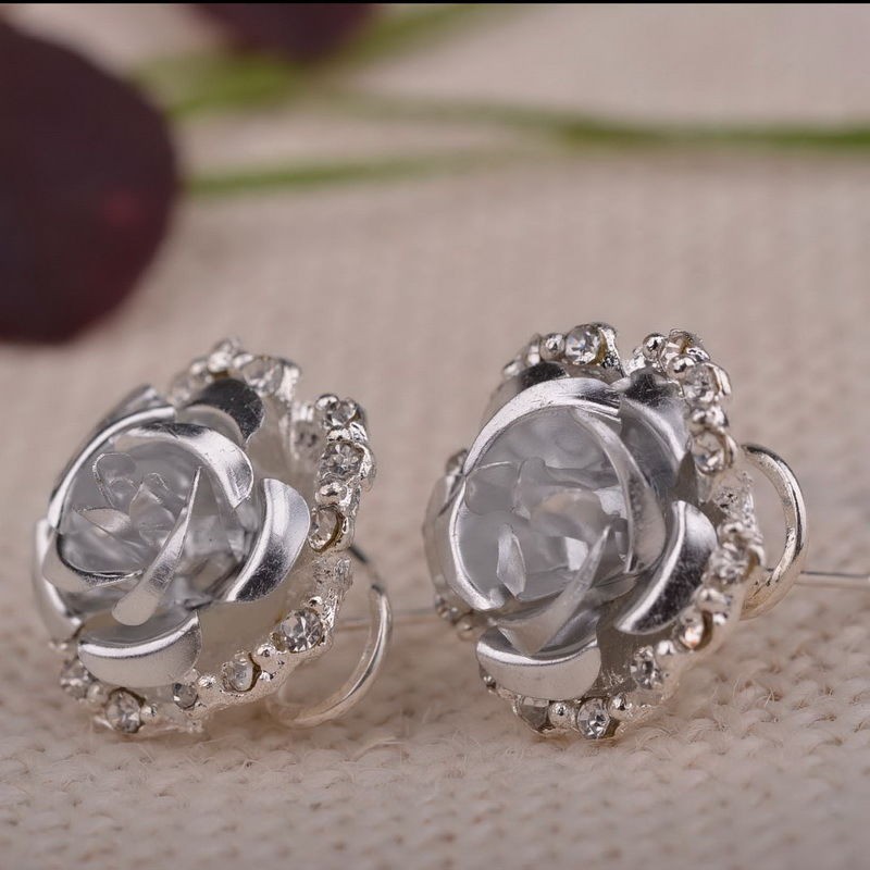Boucles d'oreilles fleur rose : blanc||Boucles d'oreilles fleur rose : blanc