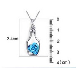 Pendentif argent avec sa chaîne et son petit coeur en cristal. Plusieurs couleurs à choix.