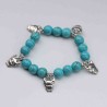 bracelet turquoise charmes argent tibetain stretch