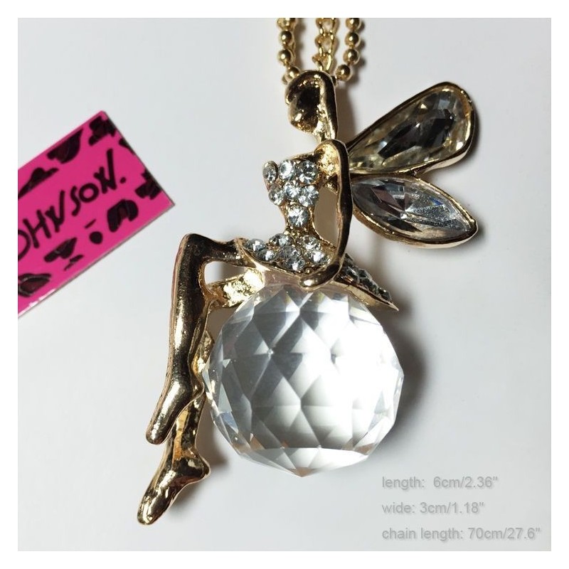 Cette superbe elfe dorée est assise sur une boule de cristal, accompagnée de son habit léger en strass arborera vos tenues pour 