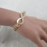 Bracelet " INFINI " doré et strass.||Bracelet " INFINI " doré et strass.||Bracelet " INFINI " doré et strass.