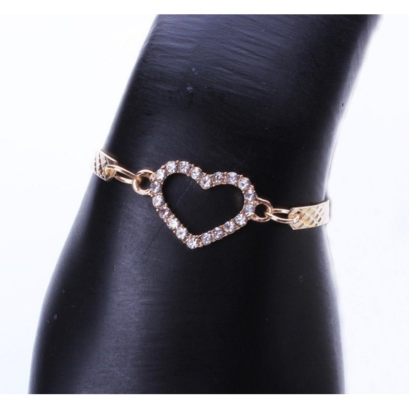 Bracelet fantaisie avec son cœur central en strass